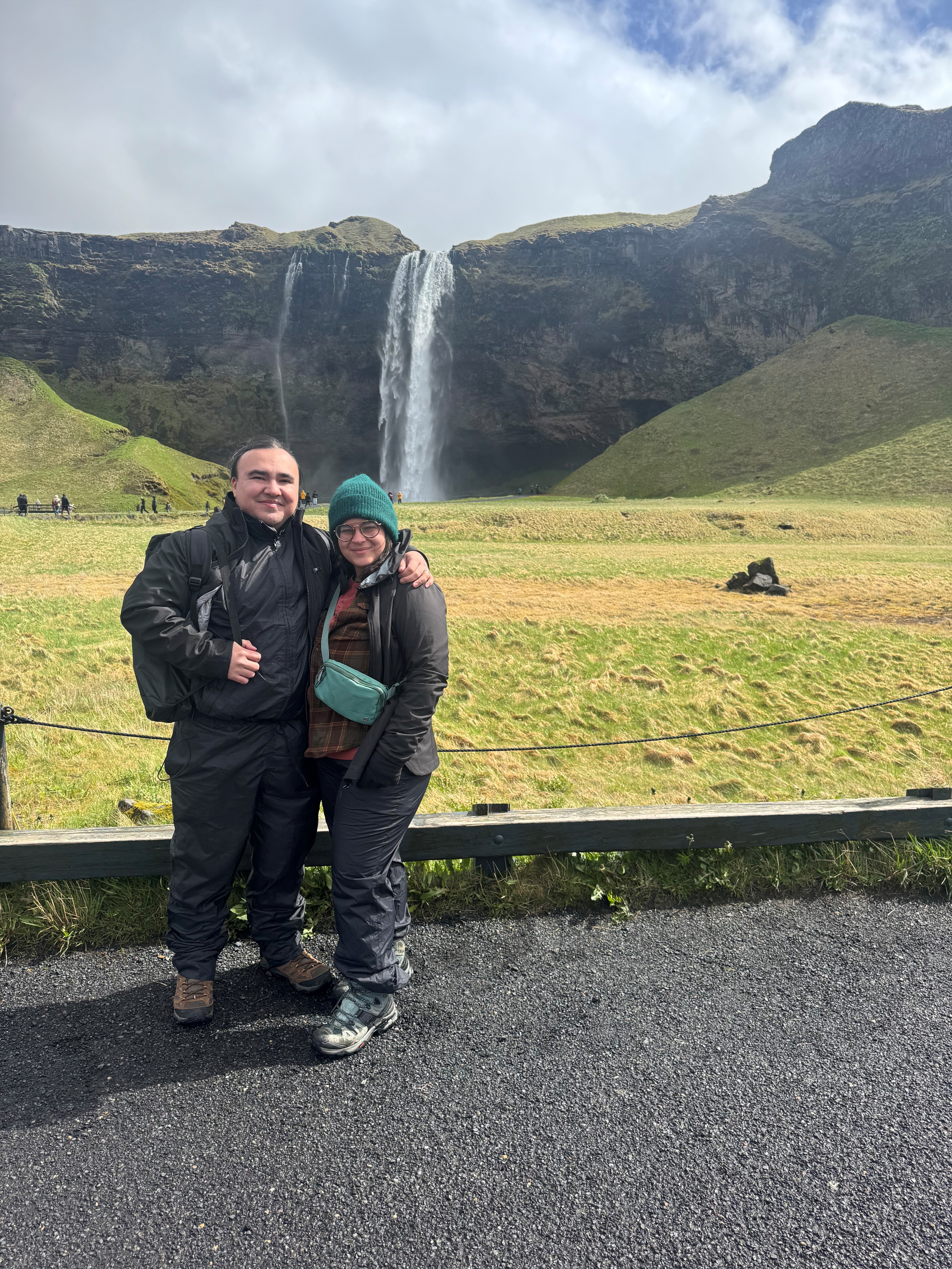 Sabrina and her husband, Rex, in front of Seljalandsfoss in Iceland
