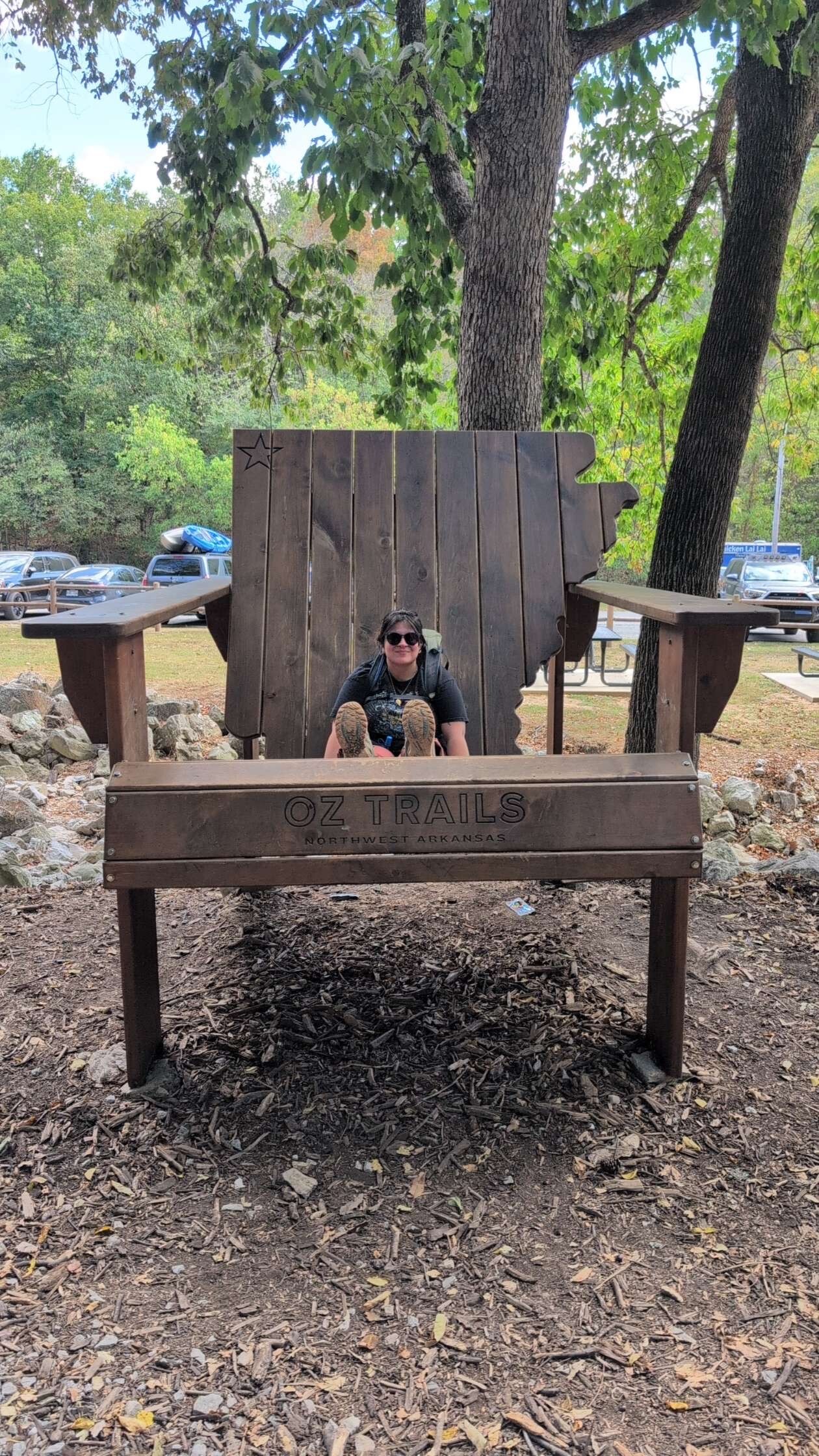 Taking a break in a big chair on the ozark trail near Bentonville Arkansas