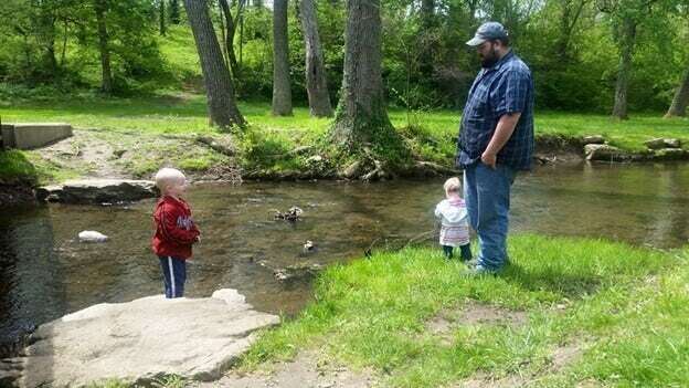 Walking the creek on the farm with the kids.