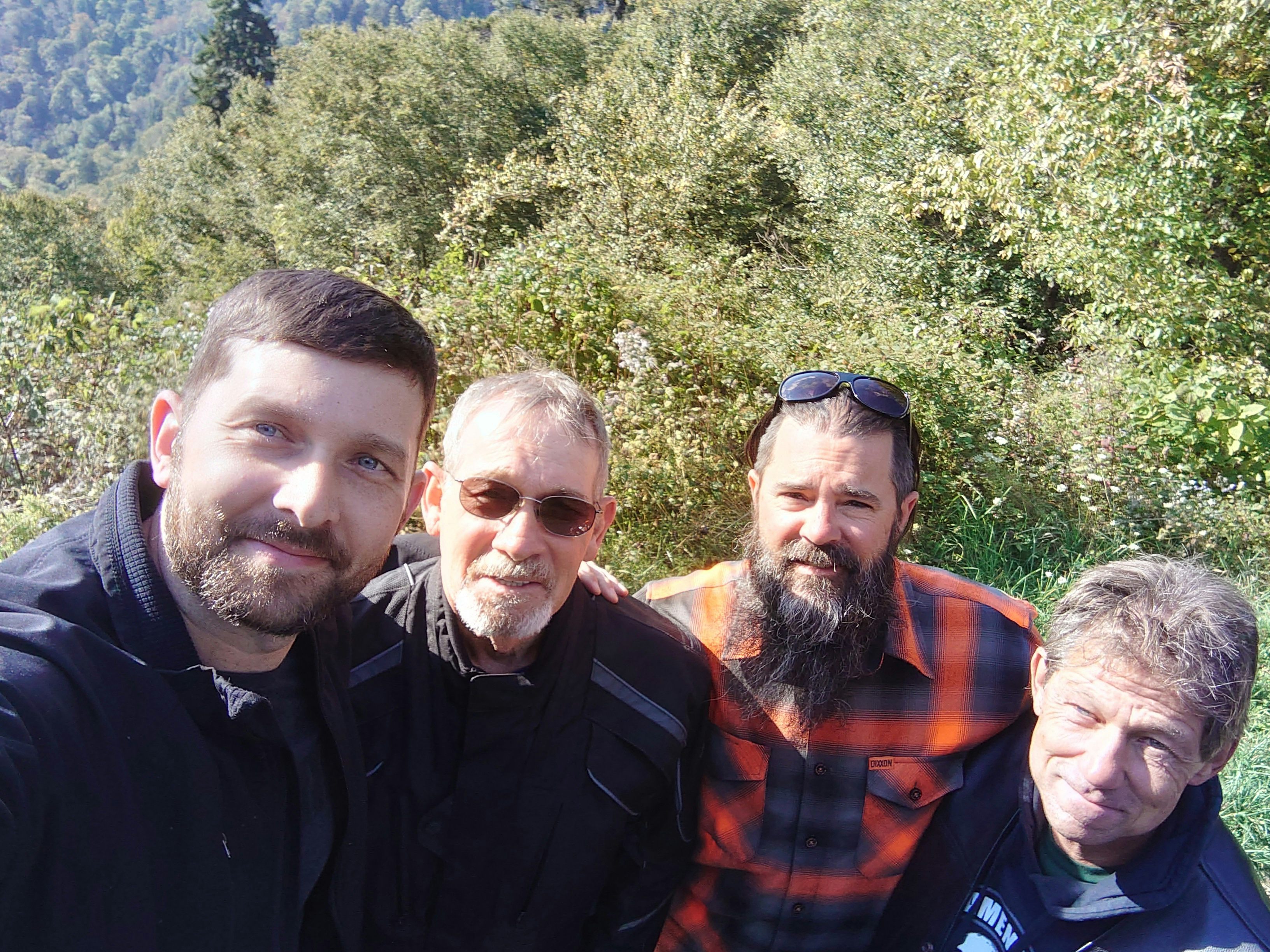 Picture with his Dad, brother-in-law, and family friend on a day they were 
riding and ended up stuck in traffic in the Smoky Mountains.