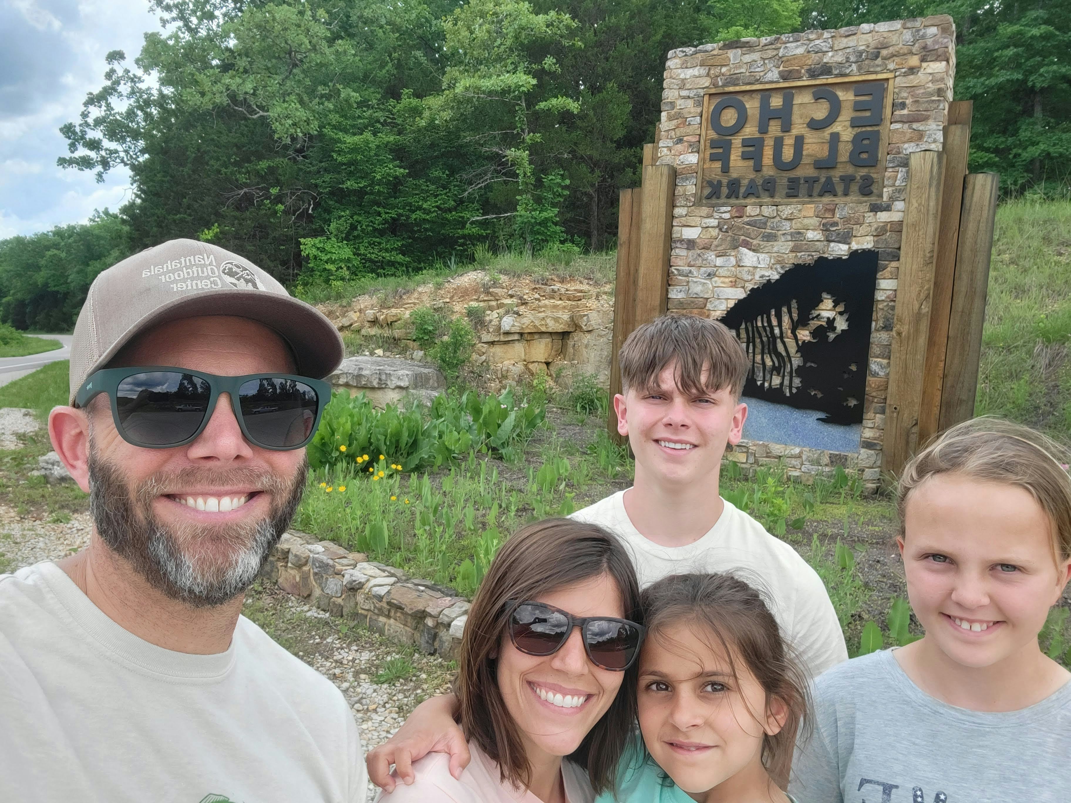Winn and his family enjoy exploring together and stopped for a selfie at 
Echo Bluff State Park.