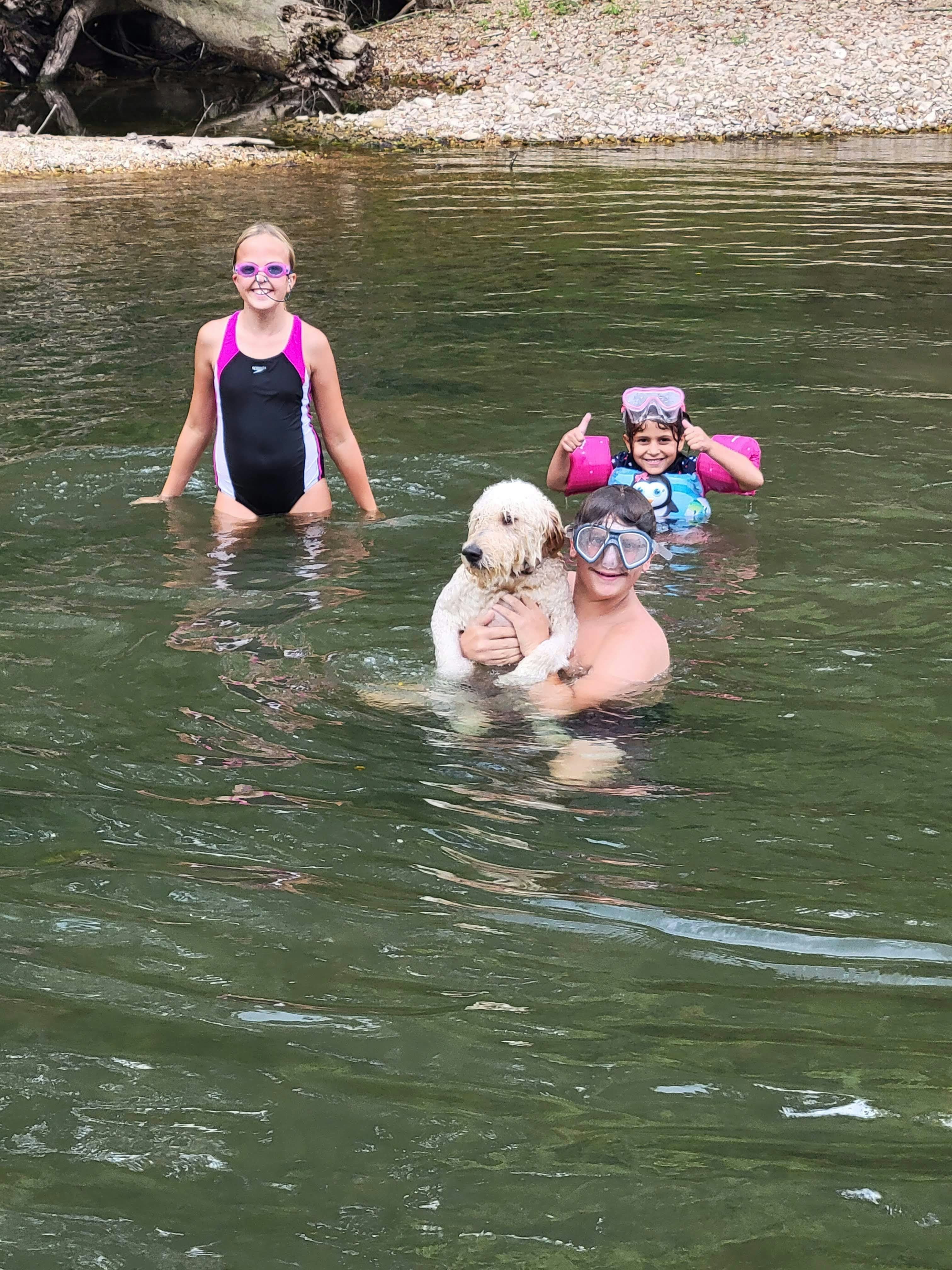 Winn's kids (and fur kid) snorkeling at the lake.