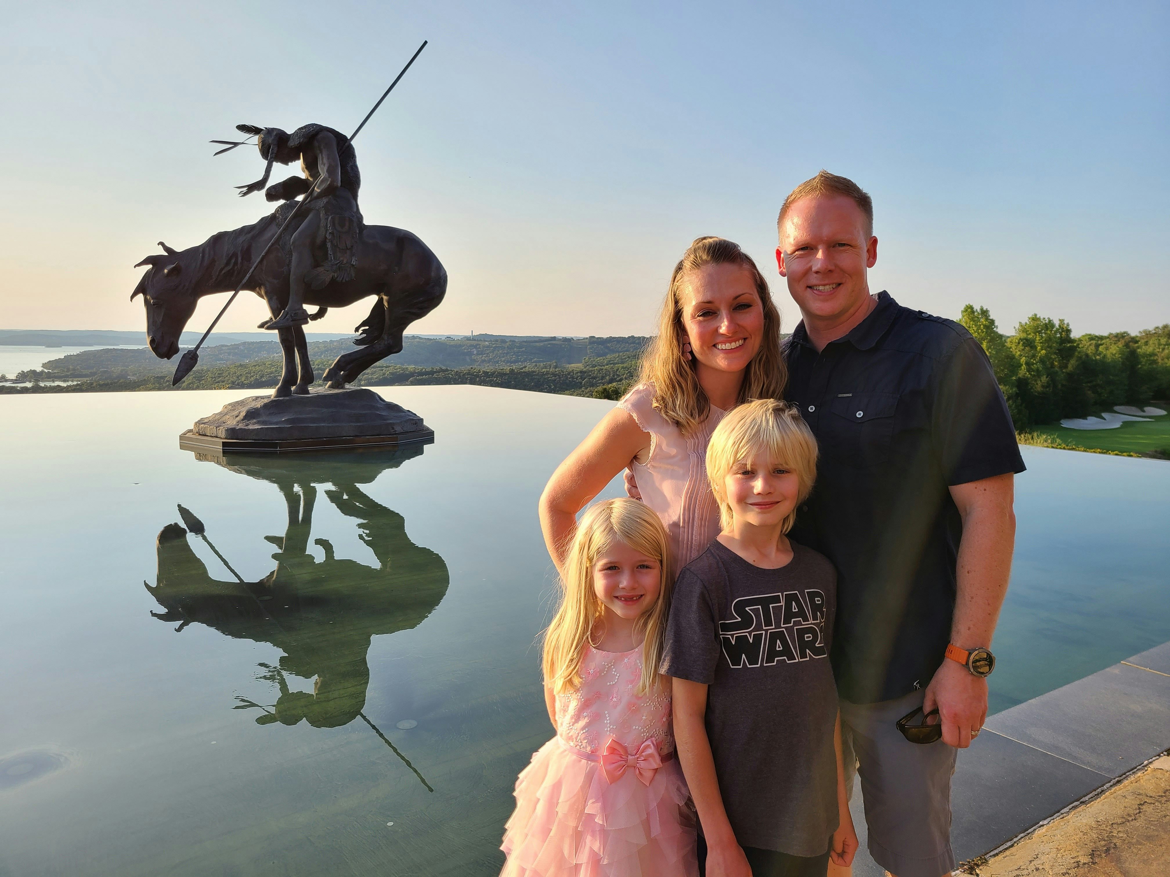 Chris' family loves living in the Ozarks. Here they are at Top of the Rock!