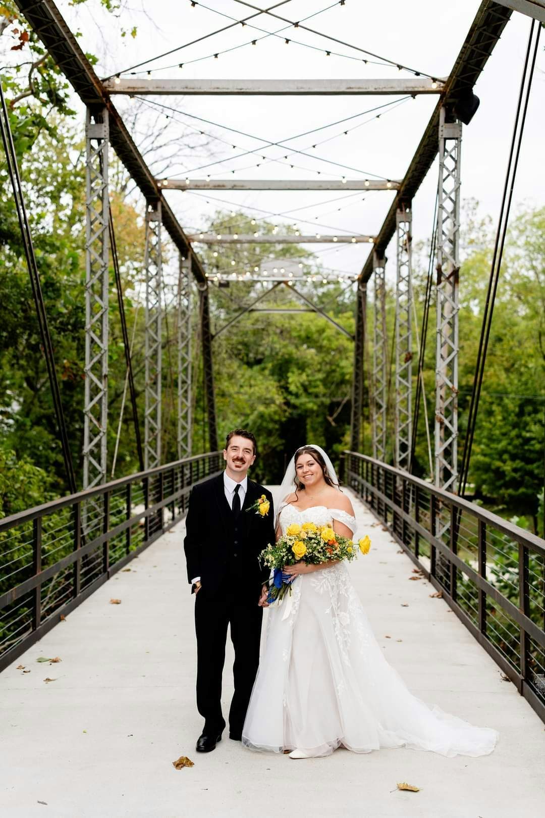 Rocco and his wife on the bridge at Finley Farms in Ozark, where they were 
married just over a year ago.