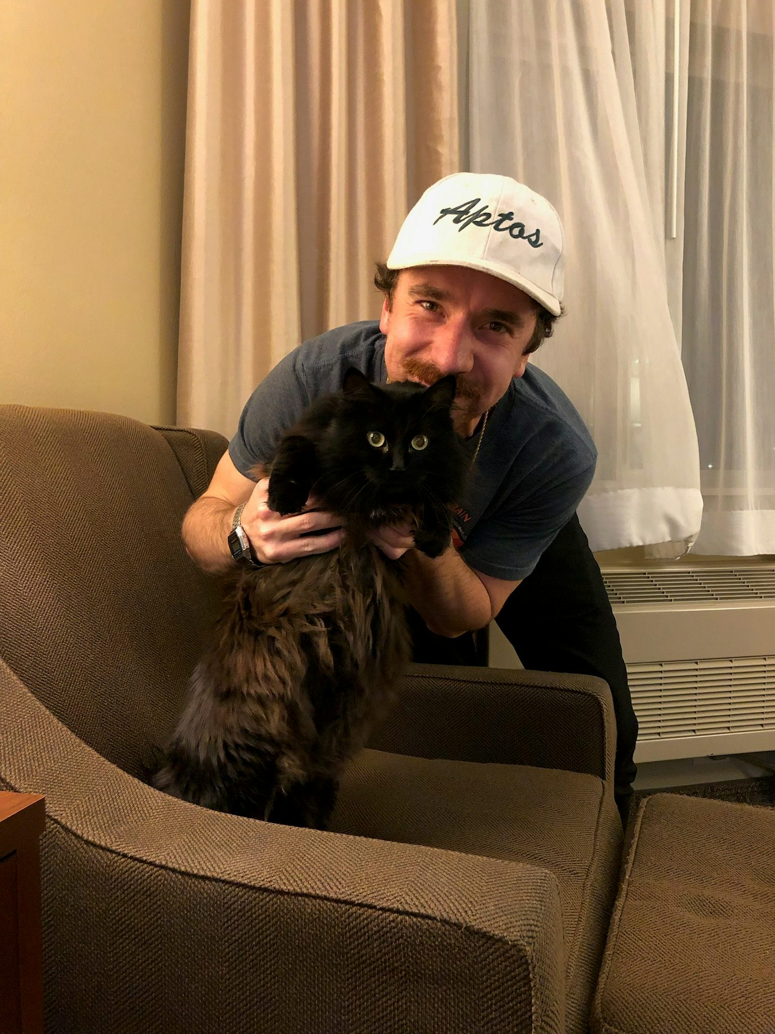 Rocco with his beloved cat, Jami (pronounced jaw-mee), in a hotel during 
their move back to Missouri. His affection for Jami is undeniable.