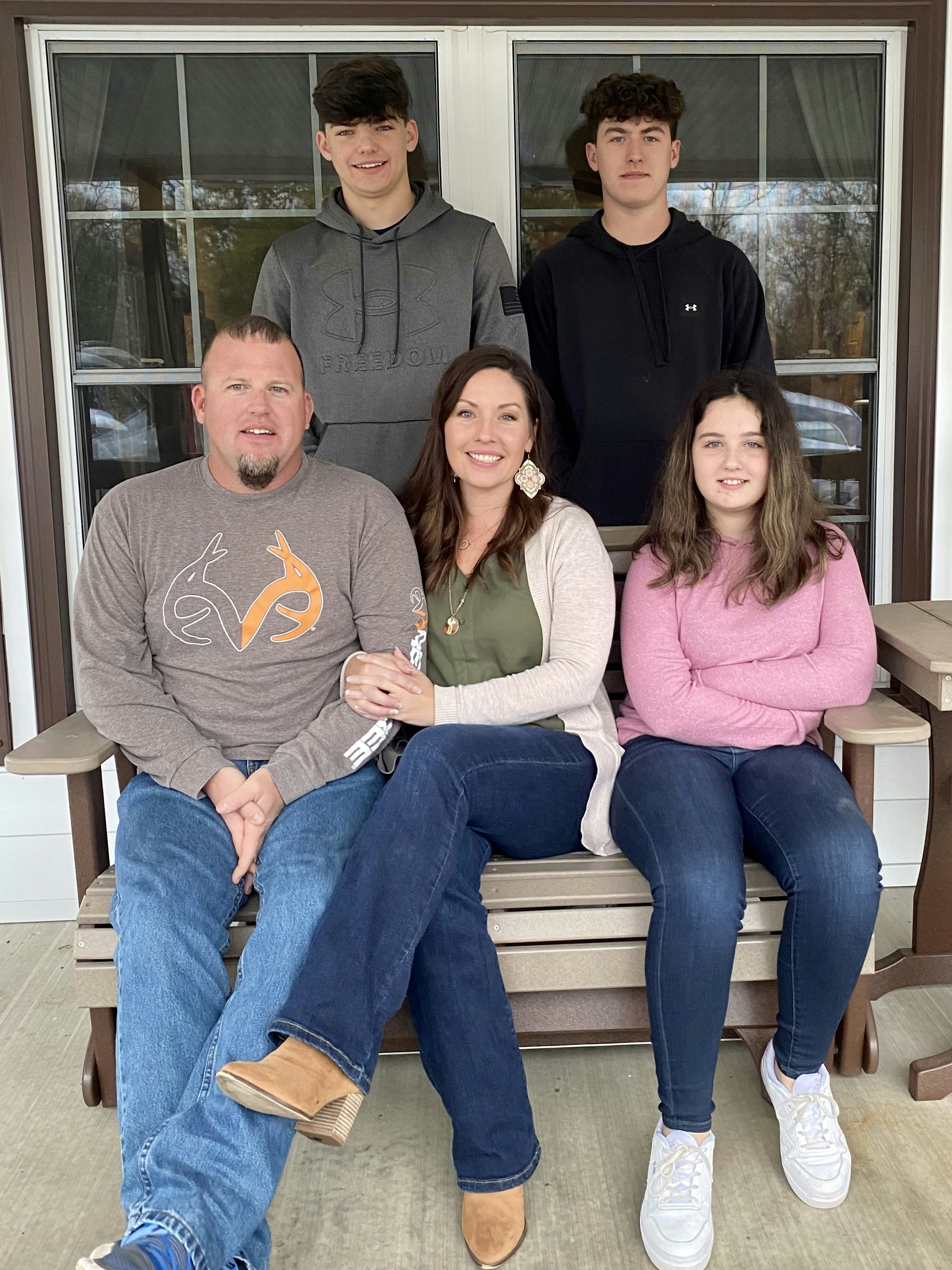 Kellie with her husband, two sons, and daughter.