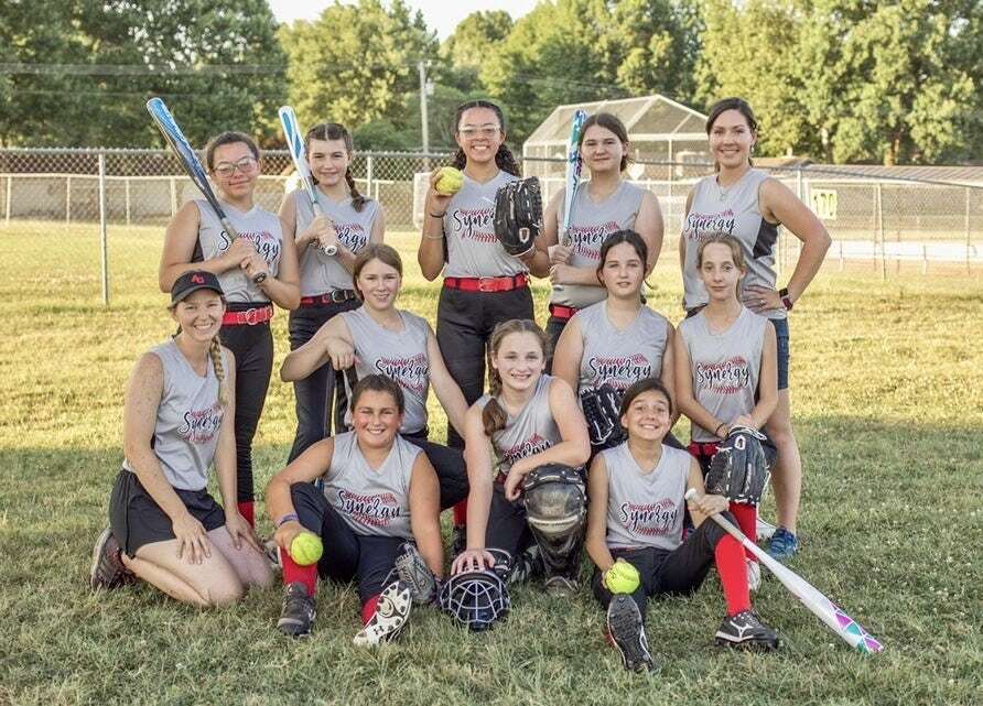 Kellie is a coach on her daughter's softball team!